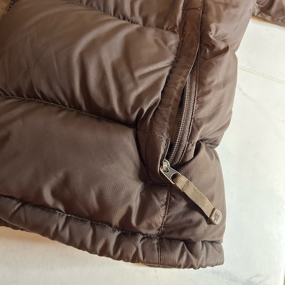 The North Face brown Puffer Jacket. Stove sack. 700.  One repair - Picture 2 of 16